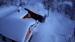 a house covered in snow